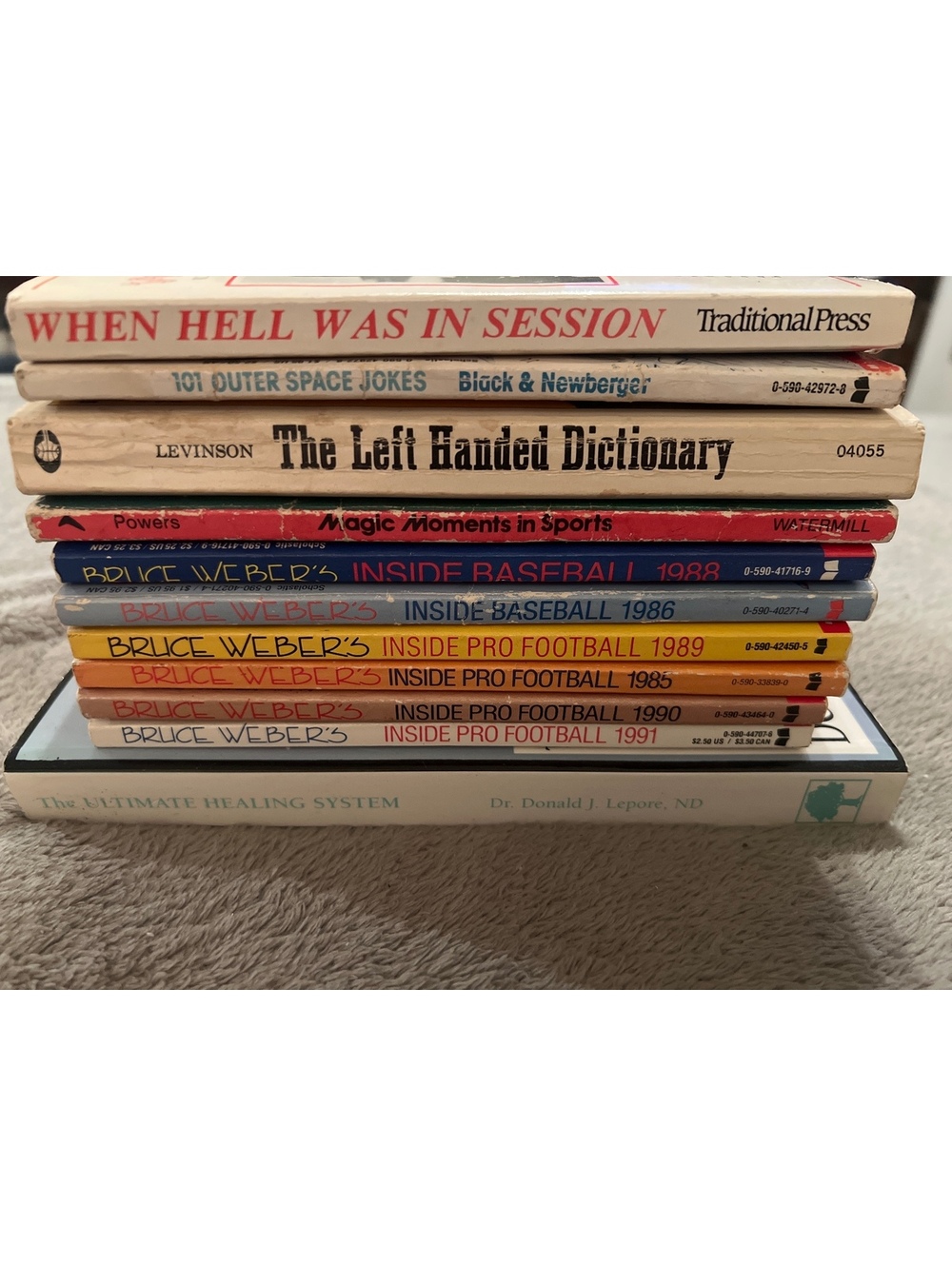 Collection of Vintage Books Including Sports, Dictionary, and Health Topics